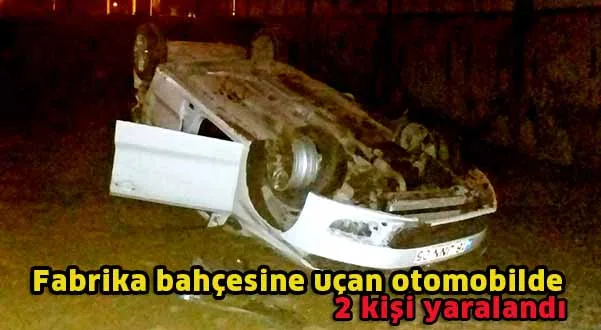 Fabrika bahçesine uçan otomobilde 2 kişi yaralandı