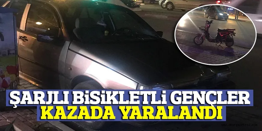 ŞARJLI BiSiKLETLi GENÇLER KAZADA YARALANDI