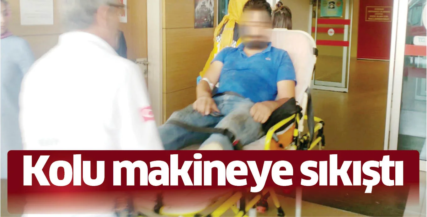 Kolu makineye sıkıştı