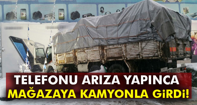 Telefonu arıza yapınca mağazaya kamyonla girdi