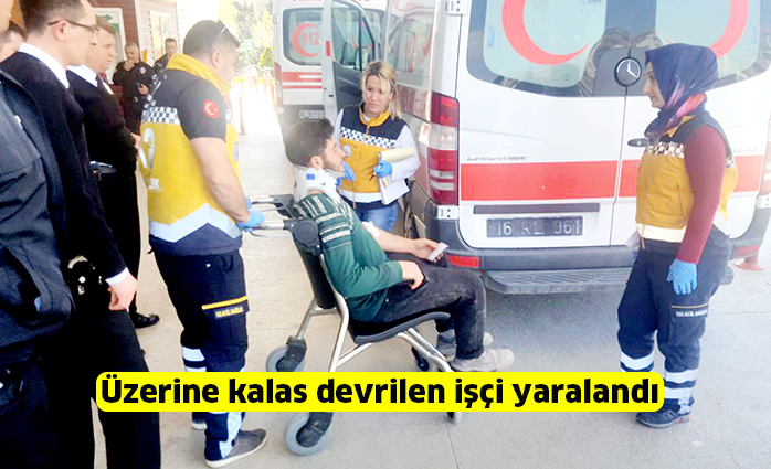 Üzerine kalas devrilen işçi yaralandı