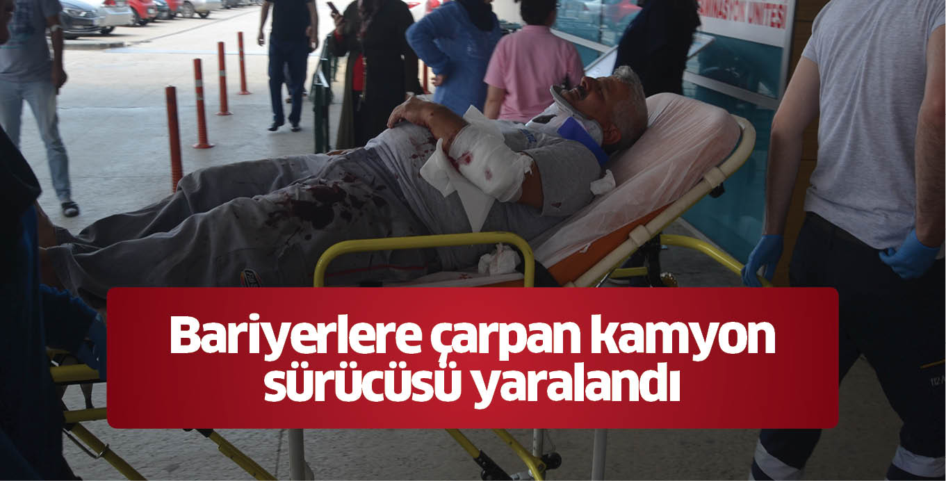 Bariyerlere çarpan kamyon sürücüsü yaralandı