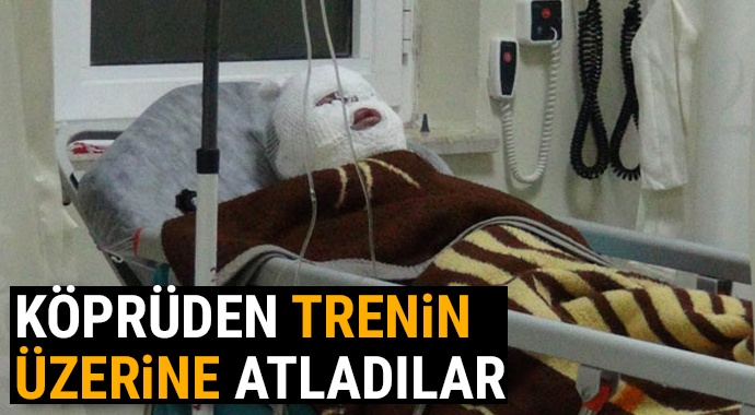 KÖPRÜDEN TREN VAGONLARINA ATLAMAK İSTEDİLER AMA…