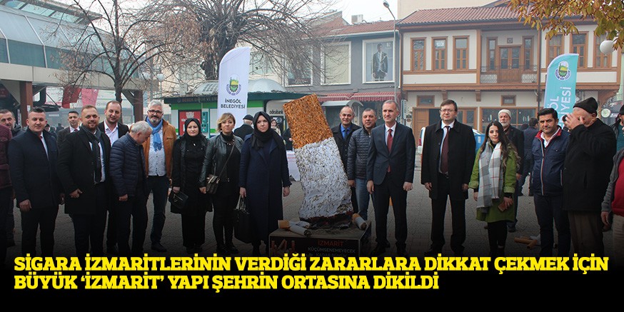 SİGARA İZMARİTLERİNİN VERDİĞİ ZARARLARA DİKKAT ÇEKMEK İÇİN BÜYÜK ‘İZMARİT’ YAPI ŞEHRİN ORTASINA DİKİLDİ