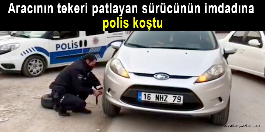 Aracının tekeri patlayan sürücünün imdadına polis koştu