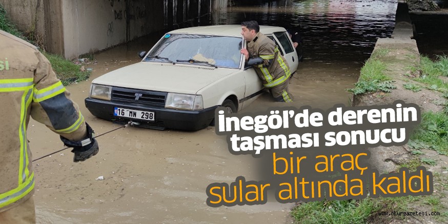 İnegöl’de derenin taşması sonucu bir araç sular altında kaldı