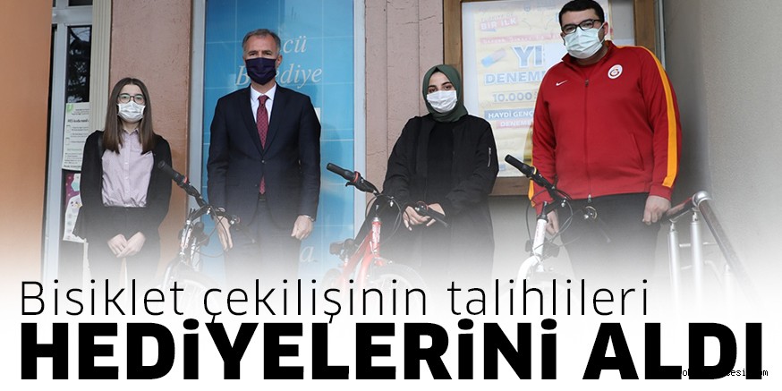 BİSİKLET ÇEKİLİŞİNİN TALİHLİLERİ HEDİYELERİNİ ALDI