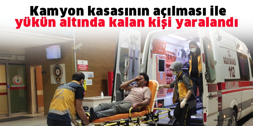 Kamyon kasasının açılması ile yükün altında kalan kişi yaralandı