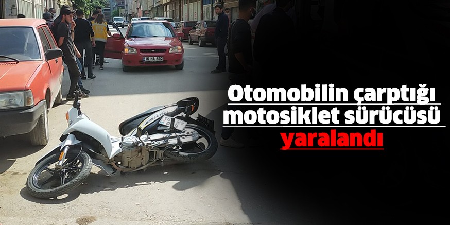 Otomobilin çarptığı motosiklet sürücüsü yaralandı