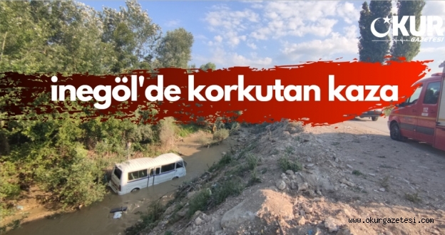 Dereye devrilen servis minibüsünün sürücüsü yaralandı