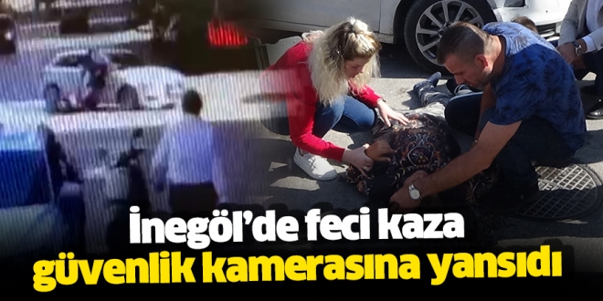 Otomobil ile çarpışan elektrikli motosikletteki iki kişinin yaralanma anı güvenlik kamerasına yansıdı