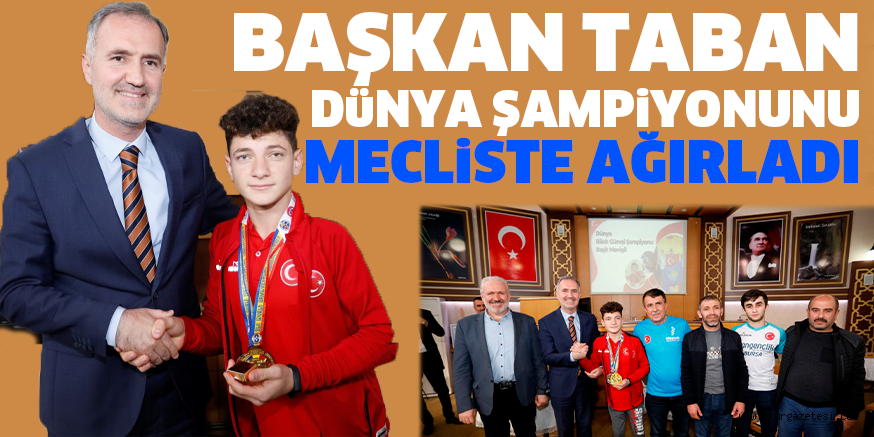 BAŞKAN TABAN DüNYA ŞAMPiYONUNU MECLiSTE AĞIRLADI