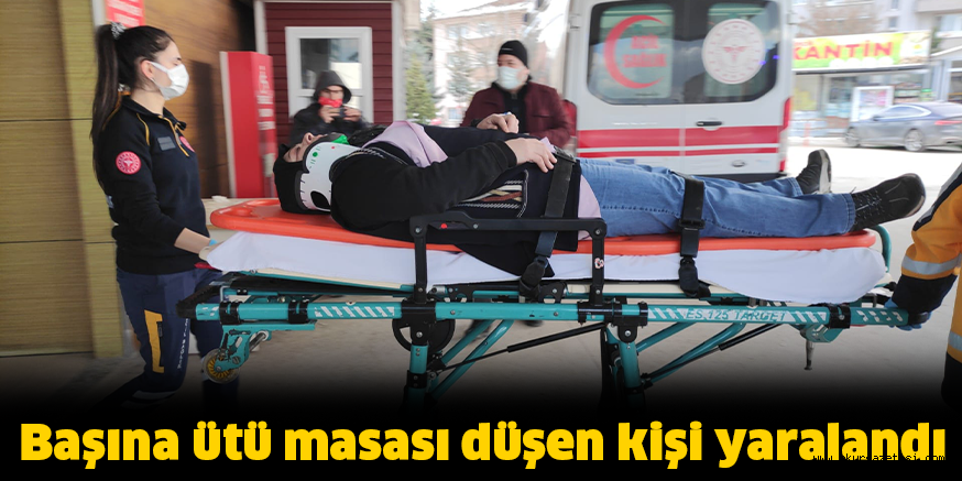 Başına ütü masası düşen kişi yaralandı