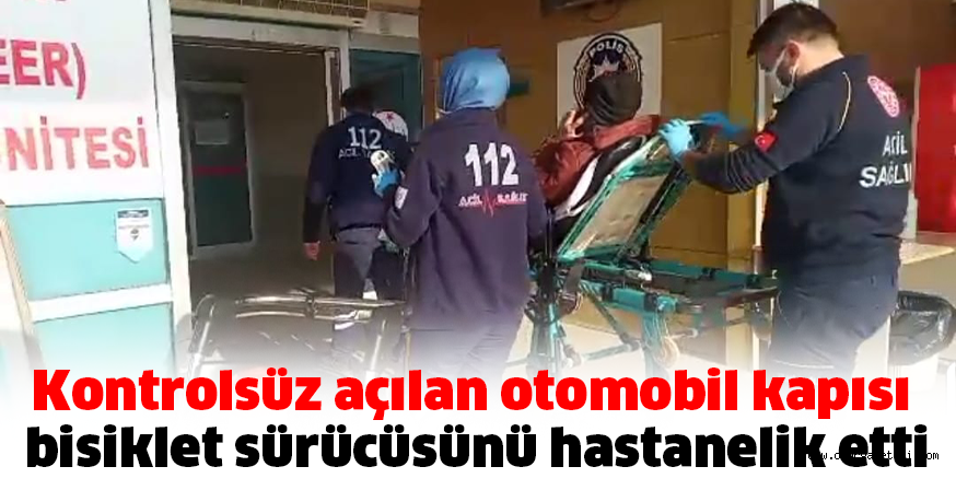 Kontrolsüz açılan otomobil kapısı,  bisiklet sürücüsünü hastanelik etti